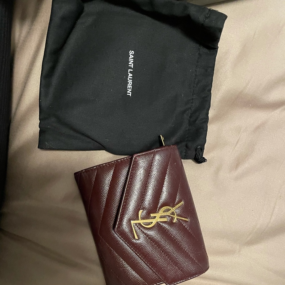Ysl Tri fold wallet.